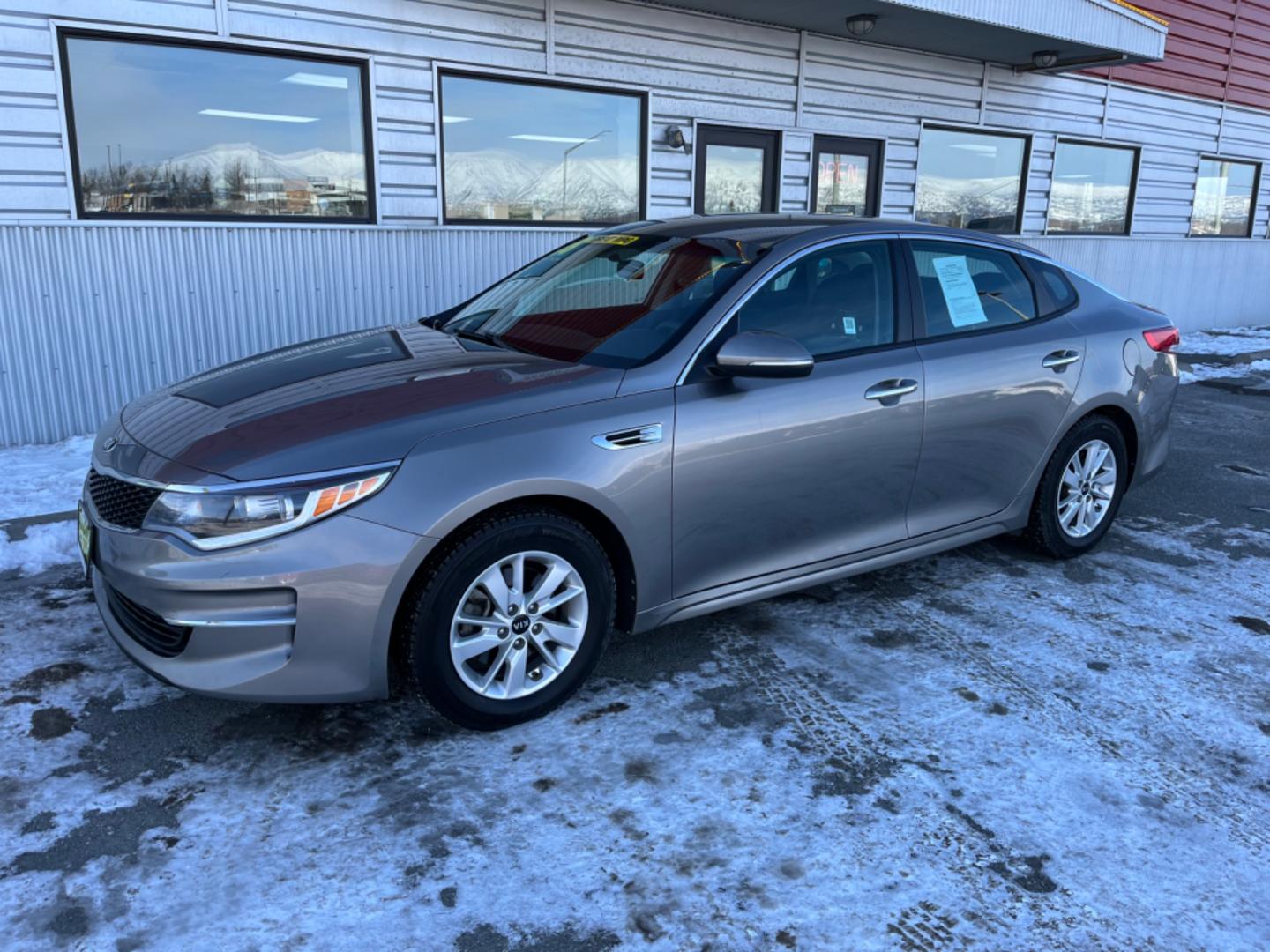 2018 Silver Kia Optima LX (5XXGT4L33JG) with an 2.4L L4 DOHC 16V engine, 6A transmission, located at 1960 Industrial Drive, Wasilla, 99654, (907) 274-2277, 61.573475, -149.400146 - Photo#0